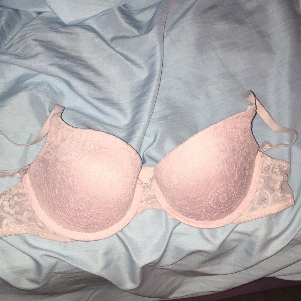 Pink lacy sheer bra.